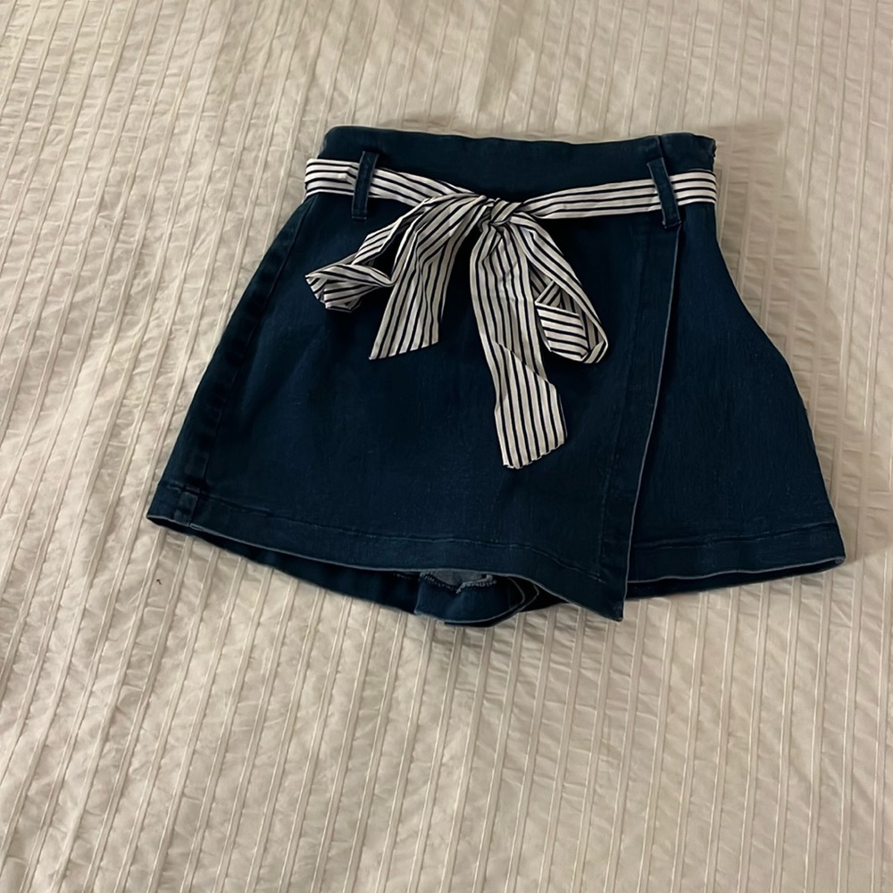 Altar’d State dark blue denim-like short with white and blue striped silk belt.